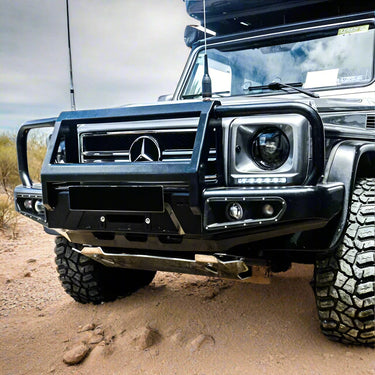 AFN 4x4 Accessories 48002402 - Bull Bar with Fog Lights Mercedes G-Wagen - 1979-2019 installed on rugged terrain vehicle